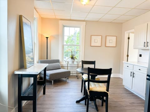 The bright, airy and cozy kitchen area warmly invites you in!
