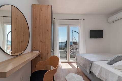 Superior Penthouse, 2 Bedrooms, Sea View | Hypo-allergenic bedding, memory foam beds, in-room safe