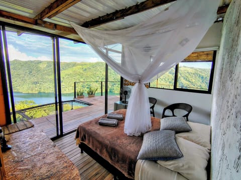 Comfort Cabin, 1 Double Bed, Lake View | 1 bedroom, free minibar, individually decorated, individually furnished