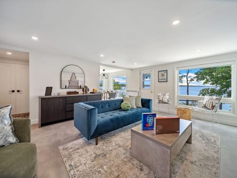 Living Room: Relax in style with breathtaking water views