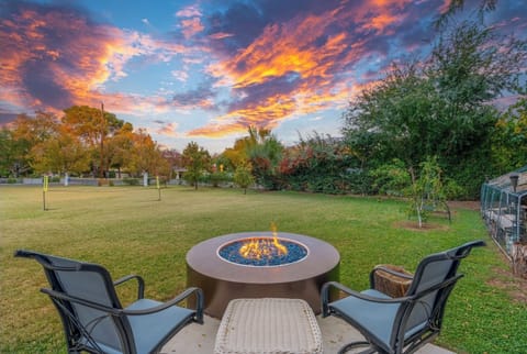 Outdoor fire pit w/ huge fenced yard and fruit orchard 