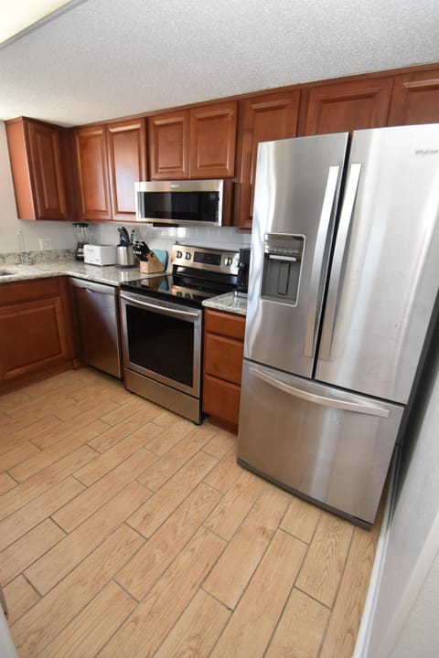 Prep a meal in the fully equipped kitchen.