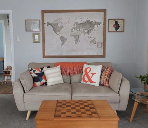 Living area - board games (chess pieces in table)  and wall mounted tv