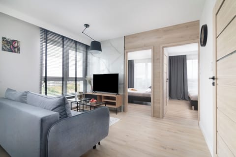 Luxury Apartment, 2 Bedrooms, Balcony, City View | Living room | 50-inch flat-screen TV with satellite channels
