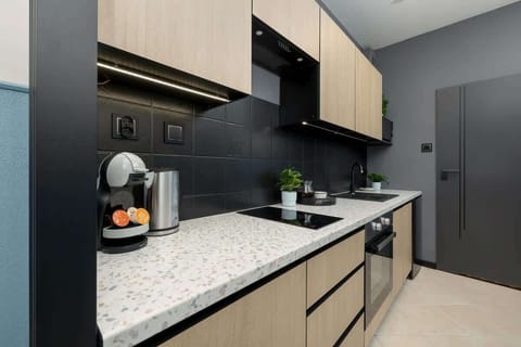 The fully equipped kitchenette includes everything you need for a home-cooked meal.