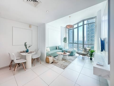Deluxe Apartment, Private Bathroom, City View | Living area | 49-inch Smart TV with cable channels, heated floors