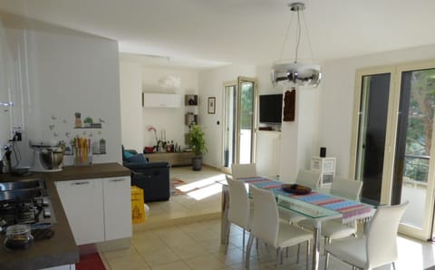 Apartment, Sea View | Living area | 32-inch flat-screen TV with cable channels