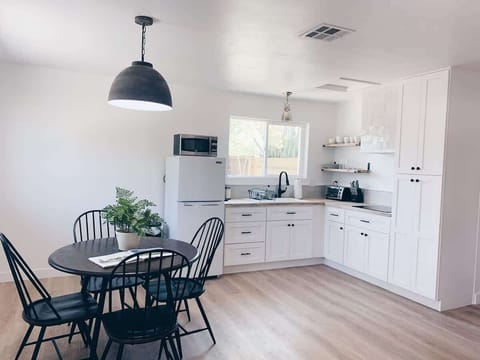 Prepare delicious meals in your fully equipped kitchen, designed for your culinary convenience.
