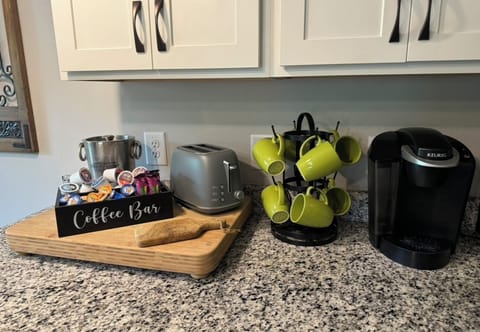 Coffee and Breakfast Prep Essentials, Toaster, Keurig, Mugs, Coffee, Creamers.
