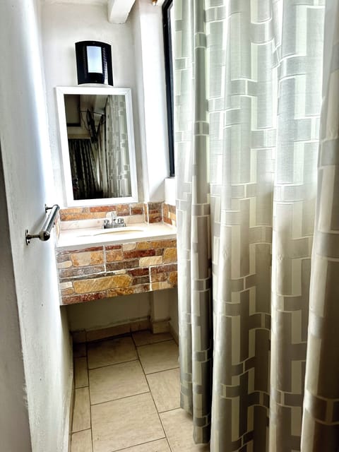 Standard Room | Bathroom | Shower, hair dryer, towels, soap
