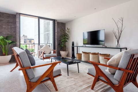 Apartment, 2 Bedrooms, Balcony (8) | Living area | 40-inch Smart TV with cable channels, heated floors