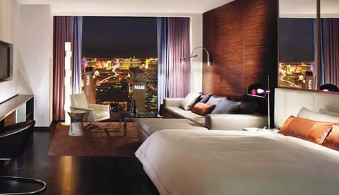 Strip View Balcony Studio Suite - Living room with queen size sofa bed may accommodate additional 2 guests.
