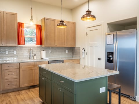 Fully Equipped Kitchen with stainless steel appliances and granite countertops!