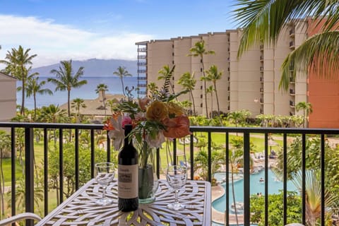 Marvel at the stunning views of the ocean, resort pool, and tropical landscape while enjoying a peaceful and private outdoor retreat.