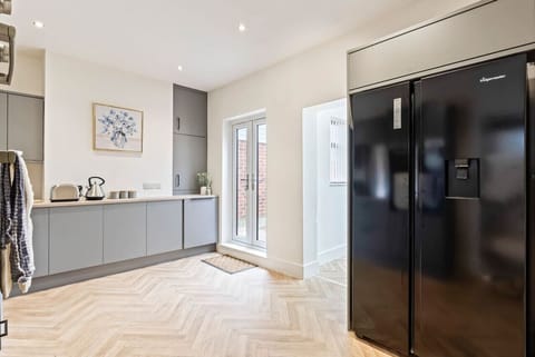 A fully equipped kitchen with everything you need to prepare a home cooked meal.