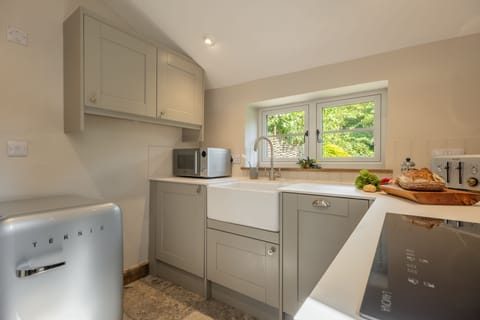 Ground floor: Kitchen with window overlooking the garden