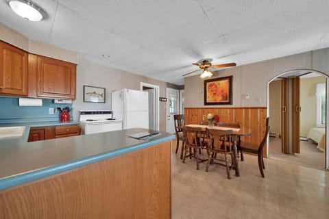 Another view of the kitchen and dining room