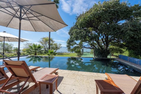 Outdoor pool, pool umbrellas, sun loungers