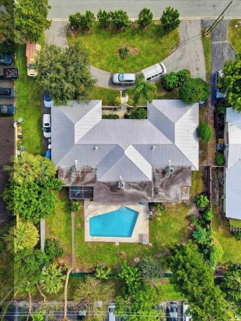 outdoor, property exterior, summer, aerial view, pool visible, daytime