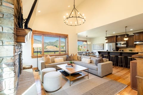 Main level great room with hardwood floors and mountain views