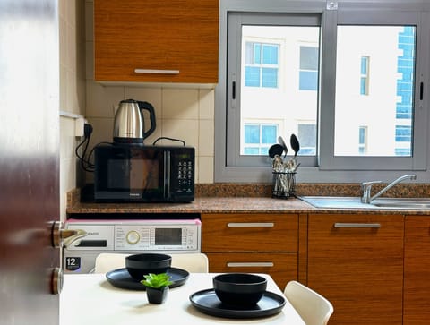 Classic Studio, Private Bathroom, City View | Private kitchen | Full-size fridge, microwave, oven, stovetop