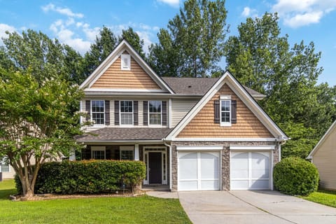 Front view with parking available on the driveway and in the garage.