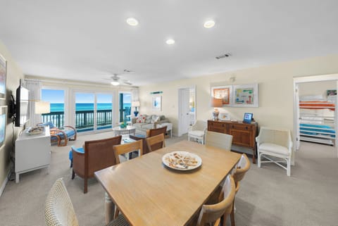 Spacious oceanfront living with stunning sea views from your dining table and cozy seating area.