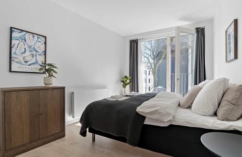 First bathroom with french balcony and lots of natural light. Also with a closet for your personal belongings, along with bedside table and double-curtains (Thin curtains and blackout curtains).