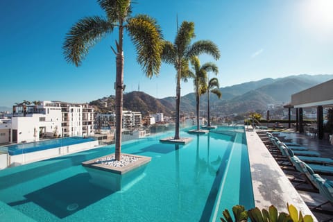 Rooftop inifinity pool with scenic views