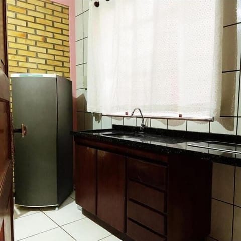 Standard Apartment | Private kitchen | Fridge, stovetop, cookware/dishes/utensils