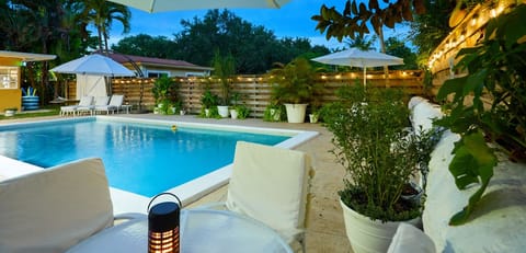 Your evening oasis-string lights, warm water & Miami nights; feels like magic