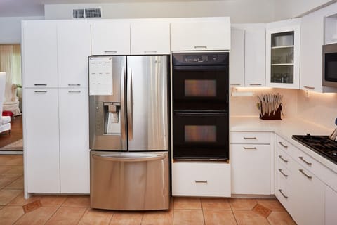 A chef’s dream—dual ovens, premium stainless appliances, and space to create.