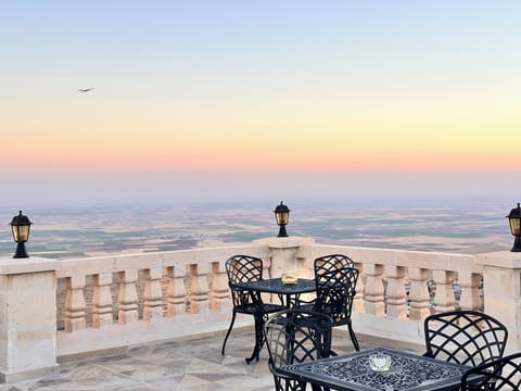 Deluxe Room, City View | Terrace/patio