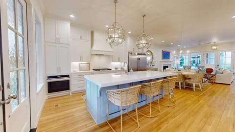 stunning kitchen with additional seating for 5