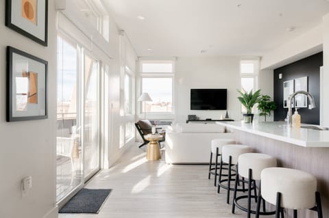 Condo, Multiple Beds, Patio, City View (Unit 404) | Living area | 40-inch TV with digital channels
