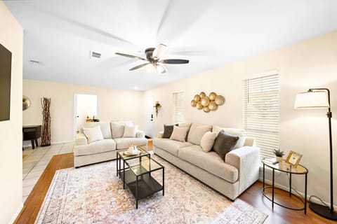 Living Room: Bright and inviting space perfect for relaxation or fun gatherings with friends!