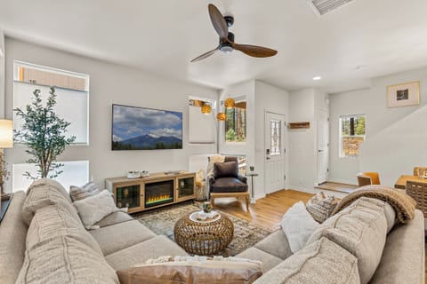 Enjoy the large flat screen and the electric fireplace for your relaxing getaway.