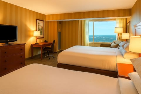 Premium bedding, down comforters, pillowtop beds, in-room safe