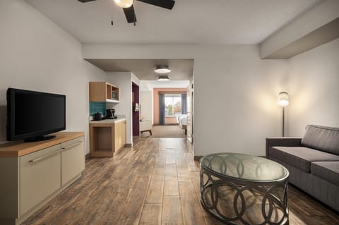 Junior Suite, 2 Queen Beds | Living area | 55-inch flat-screen TV with satellite channels