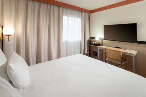 Premium bedding, individually furnished, desk, laptop workspace