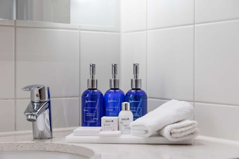 Combined shower/tub, eco-friendly toiletries, hair dryer, towels