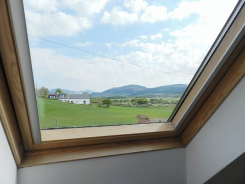 Stunning views from the bedroom | Torbeg Farm Cottage, Torbeg, near Blackwaterfoot, Isle of Arran