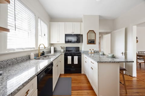 Upstairs kitchen is fully stocked & ready to be cooked in!