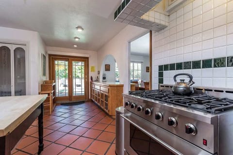 This well-equipped kitchen features a gas range and plenty of counter space—ready for preparing meals with ease.