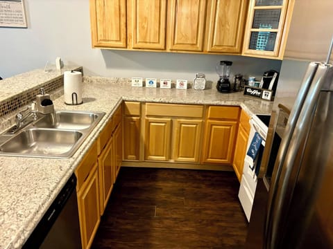 Kitchen Delight: Modern appliances shine against granite countertops, perfect for culinary adventures!