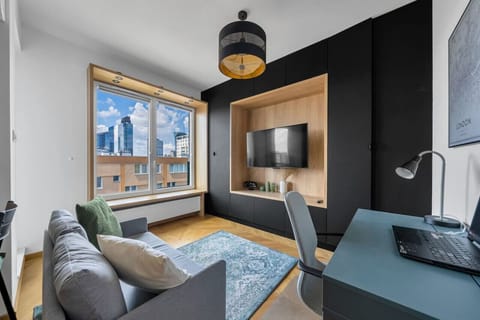 Comfortable Living Room with Sofa Bed and Smart TV | Book Now with RENTUJEMY