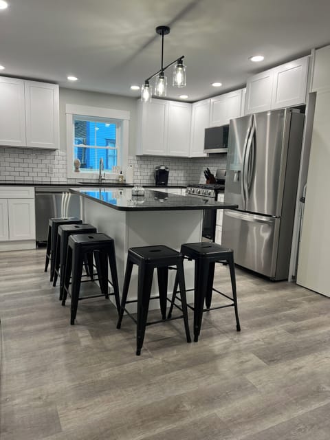 Kitchen with 2 DW, Stove and Wall oven, Micro. 5 seats at island, 3 seats at bar