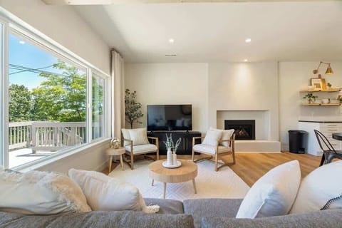
The living room offers a warm and inviting atmosphere with a beautiful fireplace as the centerpiece.