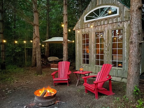 Enjoy a romantic fire by a frog pond in the woods.  