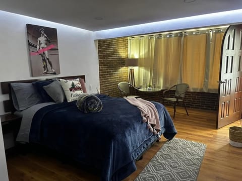 Superior Suite, 1 Queen Bed, Patio | 1 bedroom, blackout drapes, iron/ironing board, free WiFi